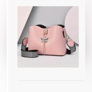 Pink bag with butterfly accent